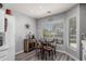 Bright breakfast nook features a round table with seating for four and stylish decor at 2910 S Olivewood --, Mesa, AZ 85212