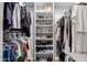 Organized closet featuring shelving with shoes and hanging clothes at 2910 S Olivewood --, Mesa, AZ 85212