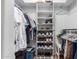 Organized closet featuring shelving with shoes and hanging clothes at 2910 S Olivewood --, Mesa, AZ 85212
