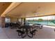 Covered picnic area near community tennis courts, perfect for socializing and enjoying outdoor activities at 2910 S Olivewood --, Mesa, AZ 85212