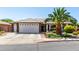 Charming single-story home featuring a two-car garage and desert landscaping at 2910 S Olivewood --, Mesa, AZ 85212