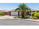 Charming single-story home with a two-car garage and desert landscaping at 2910 S Olivewood --, Mesa, AZ 85212