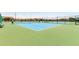 View of the blue community tennis courts offering an active lifestyle with easy access at 2910 S Olivewood --, Mesa, AZ 85212