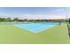 Well-maintained blue and green tennis courts, providing a fantastic recreational amenity for the community at 2910 S Olivewood --, Mesa, AZ 85212
