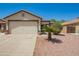 Charming single-story home featuring a desert landscape, concrete driveway, and a two-car garage at 3032 W Red Fox Rd, Phoenix, AZ 85083