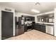 Well-equipped kitchen featuring stainless steel appliances and ample counter space for cooking and meal preparation at 3032 W Red Fox Rd, Phoenix, AZ 85083