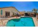 Lush backyard oasis with a sparkling pool, hot tub and gazebo at 3032 W Red Fox Rd, Phoenix, AZ 85083