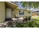 Inviting front porch with seating area, desert plants, and a charming exterior at 308 E La Jolla Dr, Tempe, AZ 85282