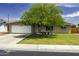 Charming single-story home featuring a well-maintained lawn and mature shade tree at 308 E La Jolla Dr, Tempe, AZ 85282