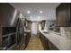 Spacious kitchen features a modern design and stainless steel appliances at 308 E La Jolla Dr, Tempe, AZ 85282