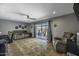Relaxing living room with tile floors and sliding glass doors leading to the patio at 308 E La Jolla Dr, Tempe, AZ 85282
