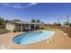 Inviting backyard pool with ladder and patio, perfect for relaxation and entertainment at 308 E La Jolla Dr, Tempe, AZ 85282