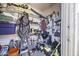 Organized storage room with shelving, tools, and equipment for home and garden maintenance at 308 E La Jolla Dr, Tempe, AZ 85282