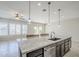 Bright, airy kitchen with a large island, stylish pendants, and ample counter space at 3280 E Coconino Dr, Gilbert, AZ 85298