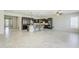 The living room is designed with tile floors and an open layout that connects to the kitchen at 3280 E Coconino Dr, Gilbert, AZ 85298