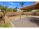 Backyard featuring a covered patio, block wall and drought tolerant landscaping at 3353 E Blackhawk Dr, Phoenix, AZ 85050