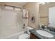 Bathroom features a granite countertop, a sink, a tub, and a shower at 3353 E Blackhawk Dr, Phoenix, AZ 85050