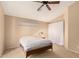 Cozy bedroom with ceiling fan, neutral carpet, and ample natural light at 3353 E Blackhawk Dr, Phoenix, AZ 85050