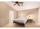 Comfortable bedroom with ceiling fan, carpet, and neutral walls at 3353 E Blackhawk Dr, Phoenix, AZ 85050