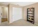 Neutral bedroom featuring plush carpet, closet, and a black bookshelf at 3353 E Blackhawk Dr, Phoenix, AZ 85050