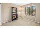 Bedroom featuring carpet, natural light and space for storage at 3353 E Blackhawk Dr, Phoenix, AZ 85050