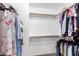 Spacious walk-in closet with ample shelving and hanging space for clothing and storage at 3353 E Blackhawk Dr, Phoenix, AZ 85050