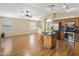 Open-concept living with kitchen island, stainless appliances, and lots of natural light at 3353 E Blackhawk Dr, Phoenix, AZ 85050