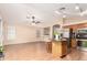 Spacious kitchen with island, stainless steel appliances, granite counters, and open layout for entertaining at 3353 E Blackhawk Dr, Phoenix, AZ 85050