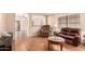 Spacious living room with hardwood floors and a view into other rooms at 3353 E Blackhawk Dr, Phoenix, AZ 85050