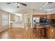 This space is a combination of a kitchen, living area, and breakfast bar at 3353 E Blackhawk Dr, Phoenix, AZ 85050