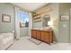 Cozy Bedroom with dresser, decorative shelving, and ample natural light at 3604 E Derringer Way, Gilbert, AZ 85297