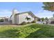 Spacious backyard with well-manicured lawn and relaxing pool at 3754 W Hearn Rd, Phoenix, AZ 85053