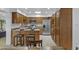Spacious kitchen with wooden cabinets, stainless steel appliances, and functional layout at 3754 W Hearn Rd, Phoenix, AZ 85053