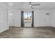 Bright and airy living room featuring new floors, fresh paint, and lots of natural light at 3754 W Hearn Rd, Phoenix, AZ 85053