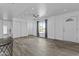 Inviting living room with modern floors, neutral paint, and lots of natural light at 3754 W Hearn Rd, Phoenix, AZ 85053