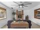 Comfortable living room with a fireplace and bright light with decorative accents at 3754 W Hearn Rd, Phoenix, AZ 85053