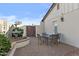 Private patio with water feature, mature landscaping, and outdoor dining at 3754 W Hearn Rd, Phoenix, AZ 85053