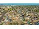Vibrant aerial view showcasing a residential neighborhood with lush greenery and diverse architectural styles at 3944 W Wilshire Dr, Phoenix, AZ 85009