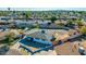 Aerial view of a home with a large, fenced backyard with a storage shed, located in a well-established neighborhood at 3944 W Wilshire Dr, Phoenix, AZ 85009