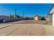Large backyard with a shed and mature trees, perfect for outdoor activities at 3944 W Wilshire Dr, Phoenix, AZ 85009