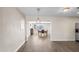 Open-concept dining area with stylish pendant lighting and sleek flooring at 3944 W Wilshire Dr, Phoenix, AZ 85009