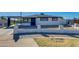 A cozy single-Gathering home featuring a well-maintained lawn and charming front porch at 3944 W Wilshire Dr, Phoenix, AZ 85009