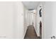 Hallway showcasing the home's new flooring leading to bedrooms at 3944 W Wilshire Dr, Phoenix, AZ 85009