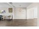 Bright living space with modern lighting and smooth flooring at 3944 W Wilshire Dr, Phoenix, AZ 85009
