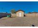 Storage shed in the backyard, providing extra space for tools and equipment at 3944 W Wilshire Dr, Phoenix, AZ 85009