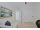 Bedroom with a ceiling fan, a sliding door closet, and art on the wall, creating a comfortable space at 4039 E Paradise Dr, Phoenix, AZ 85028