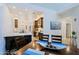 Open concept design integrating the dining room, kitchen, and breakfast nook for a seamless flow at 4039 E Paradise Dr, Phoenix, AZ 85028