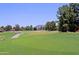 Picturesque golf course view with rolling green fairways and mountain backdrop at 4039 E Paradise Dr, Phoenix, AZ 85028