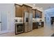 Modern kitchen features stainless steel appliances and ample counter space for cooking at 4039 E Paradise Dr, Phoenix, AZ 85028