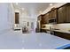 Modern kitchen featuring stainless steel appliances, sleek countertops, and shaker style cabinets at 4039 E Paradise Dr, Phoenix, AZ 85028